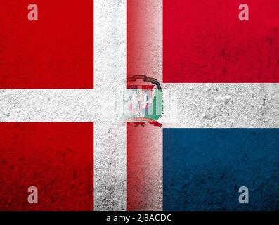 the Kingdom of Denmark National flag with National flag of Dominican Republic. Grunge Background Stock Photo