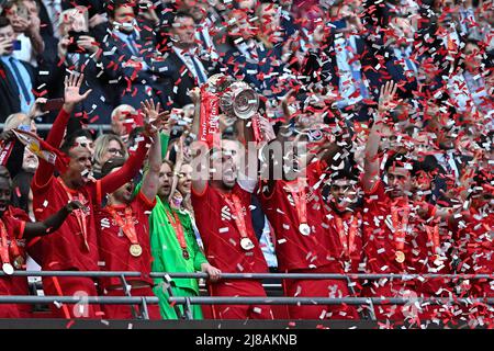 London, UK. 14th May, 2022. Jordan Henderson (Liverpool) holds the FA Cup aloft and celebrates during the FA Cup Final match between Chelsea and Liverpool at Wembley Stadium on May 14th 2022 in London, England. (Photo by Garry Bowden/phcimages.com) Credit: PHC Images/Alamy Live News Stock Photo