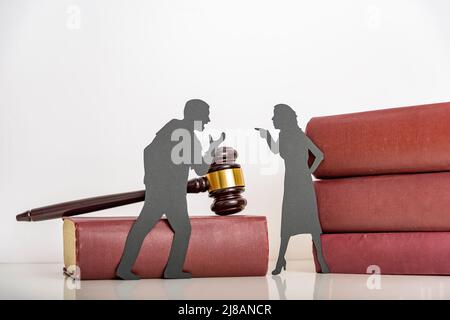 couple a man and a woman quarrel. the concept of emotional aggression between husband and wife. problems in the relationship. silhouette people shout Stock Photo