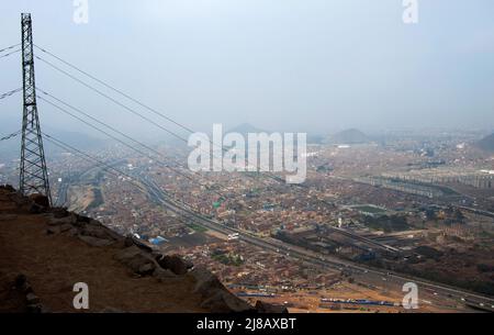 Lima, Peru; 09092012: Panoramic view of Lima from Cerro San Cristobal, at 850 m. Electric transmisson tower Stock Photo