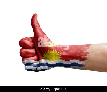 Hand making thumb up painted with flag of kiribati Stock Photo