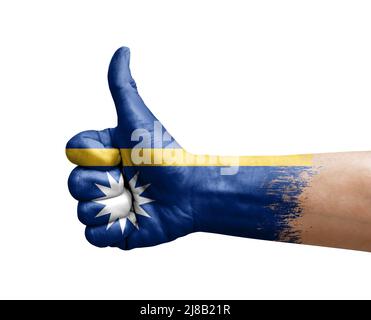 Hand making thumb up painted with flag of nauru Stock Photo