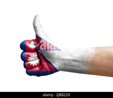 Hand making thumb up painted with flag of nepal Stock Photo