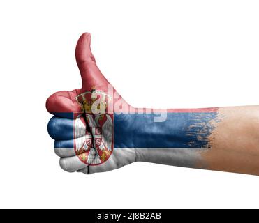 Hand making thumb up painted with flag of serbia Stock Photo