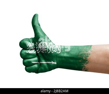 Hand making victory sign, saudi arabia painted with flag as symbol of ...