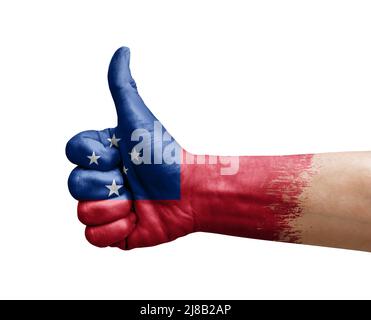 Hand making thumb up painted with flag of samoa Stock Photo