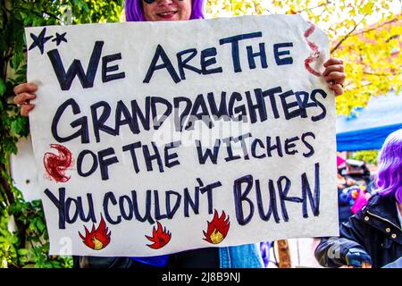 2021-10-02 Tulsa USA - Woman with purple hair holding sign reading We are the Granddaughters of the Witches You couldn't burn on bright fall day a rep