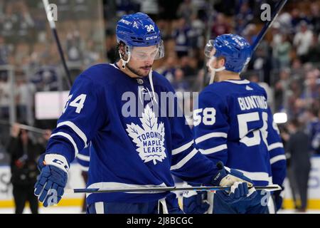 Toronto Maple Leafs centre Auston Matthews (34) chases Montreal Canadiens  defenceman Shea Weber (6) during first period NHL exhibition hockey action  ahead of the Stanley Cup playoffs in Toronto on Tuesday, July