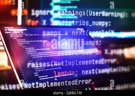 Monitor closeup of function source code. Abstract IT technology background. Software source code. Stock Photo