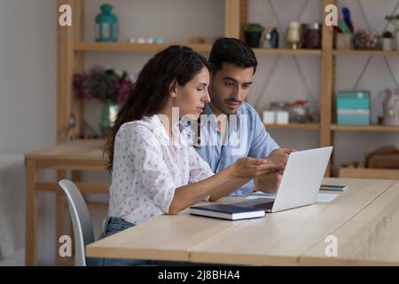 Two business team employees collaborating on online project Stock Photo