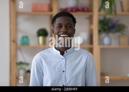 Happy millennial African American intern, entrepreneur, freelance employee head shot Stock Photo