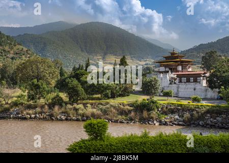 Bhutan - October 24, 2021: The Punakha Dzong between the Pho Chhu and Mo Chhu river in Bhutan. Punakha Dzong Monastery, one of the largest monasteries Stock Photo