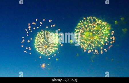 two blur fireworks on dark blue sky. Stock Photo