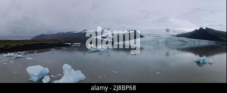Glacier tongue with lake and icebergs panorama Stock Photo