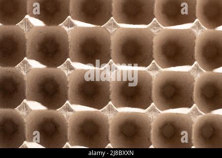 Abstract background. frame geometry. Egg packaging. Paper tray for domestic eggs. Beige and grey. Minimalism. Paper packaging egg carton Stock Photo