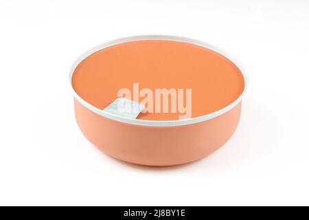 Orange tin can tuna meal packaging isolated on white background Stock Photo