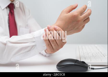 Mouse hand syndrome in Asian young man. Pain at the base of thumb due ...