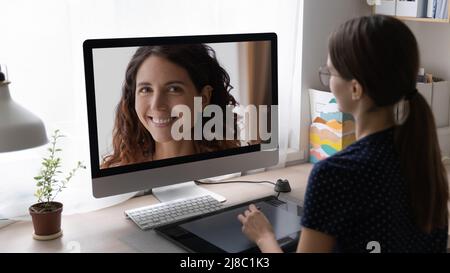 Young freelance female graphic retouch professional editing image Stock Photo