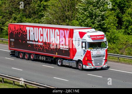John named Driver driving TRUCKINGBY (TRUCKING BY) Brian Yeardly Continental DAF 530 FT Truck rigid rear wheel lift;  driving on the M61 Motorway, Manchester, UK Stock Photo