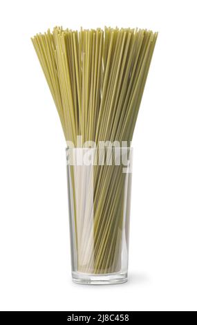 Front view of green uncooked spinach spaghetti in glass isolated on white Stock Photo