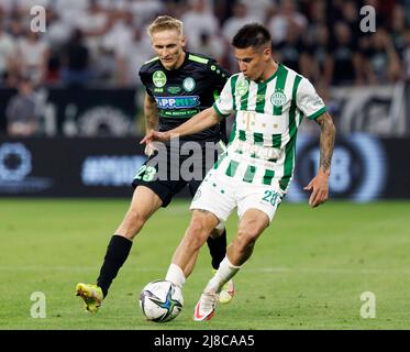 BUDAPEST, HUNGARY - MAY 11: Kristoffer Zachariassen of Ferencvarosi TC runs  with the ball during the Hungarian Cup Final match between Ferencvarosi TC  and Paksi FC at Puskas Arena on May 11