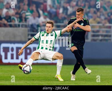 BUDAPEST, HUNGARY - MAY 11: Franck Boli of Ferencvarosi TC celebrates after  scoring a goal with Miha Blazic of Ferencvarosi TC during the Hungarian Cup  Final match between Ferencvarosi TC and Paksi