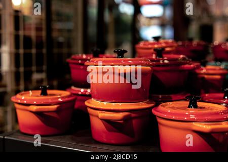 Small Dutch stoves in a shop window, miniature crockery. Stock Photo