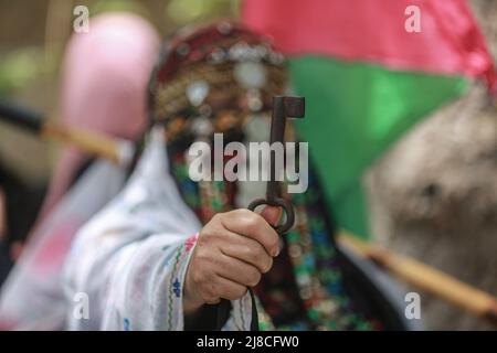 A key, symbol of the palestinian right of return, at the entrance of ...