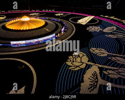 Pathum Thani, Thailand, May 15, 2022. Aerial view of 210,000 LED lanterns at Wat Phra Dhammakaya during Visakha Bucha Day 2022. Wat Phra Dhammakaya commemorates International Vesak Day (Visakha Bucha) by lighting 210,000 LEDs depicting the Lord Buddha's Birth, Enlightenment, and Great Decease. Matt Hunt/Neato. Stock Photo