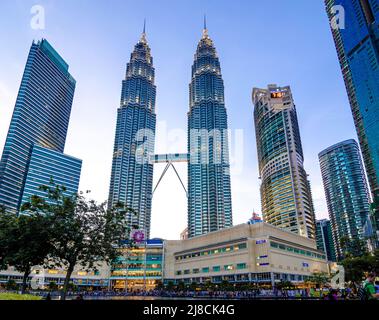 Kuala Lumpur , Malaysia - May 14, 2022: Kuala Lumpur City Center, Menara Berkembar PETRONAS Two 88-story towers connected by a bridge. One of the tall Stock Photo
