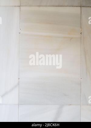 Vertical White marble on a wall. Marble tiles textures Stock Photo