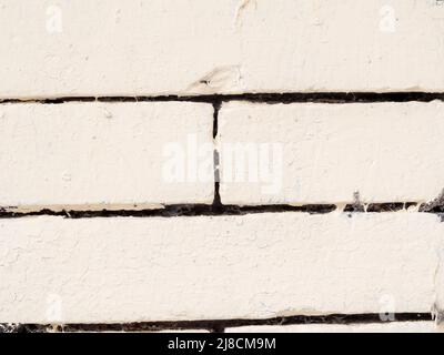 white brick wall background in aged historical building. Stock Photo