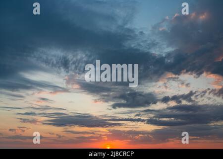 Fantastic soft thunderclouds at sunrise, natural composition Stock Photo