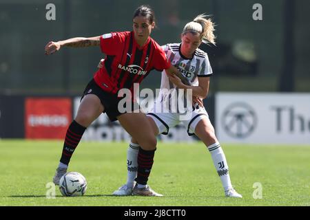 Milan, Italy, 14th May 2022. Linda Sembrant of Juventus tussles with Martina Piemonte of AC Milan during the Serie A Femminile match at Centro Sportivo Vismara, Milan. Picture credit should read: Jonathan Moscrop / Sportimage Stock Photo