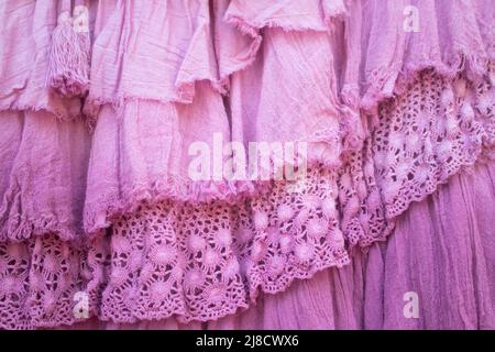Pink layers of frilled gauze and lace background - selective focus Stock Photo