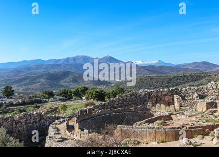 View looking down at Mycenae Greece - The fortified citadel nested over the fertile plain of Argolis near the seashore in the northeast Peloponnese - Stock Photo