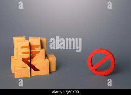 Indian rupee goods boxes and prohibition symbol NO. Ban on import goods. Impossibility of transportation, oversupply. Sanctions and embargoes. Shortag Stock Photo