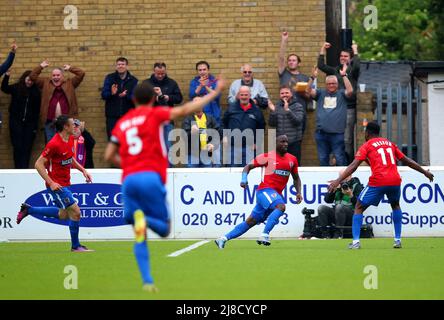Dagenham and Redbridge's Junior Morias (centre) celebrates scoring their side's first goal of the game during the Vanarama National League match at the Chigwell Construction Stadium, London. Picture date: Sunday May 15, 2022. Stock Photo