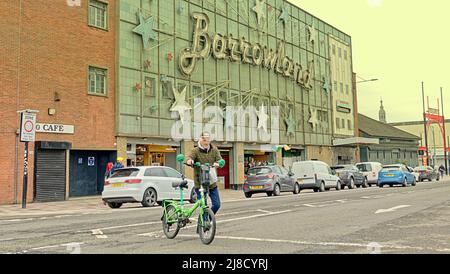 Glasgow, Scotland, UK 15th May, 2022. Gentrified Barras market with few people and improved shopping gone are the flea bag stalls and lots of shop like premises with few of of its traditional poor customers. The fanous barrowland ballroom now more famous as a music venue, with its stalls underneath. Credit Gerard Ferry/Alamy Live News Stock Photo