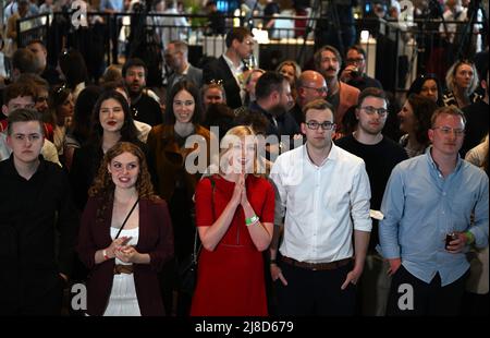 Duesseldorf, Germany. 15th May, 2022. Participants of the SPD election party wait for the first forecasts in Düsseldorf's Rheinterrassen. In North Rhine-Westphalia, the election for the 18th state parliament takes place on Sunday. Credit: Bernd Thissen/dpa/Alamy Live News Stock Photo
