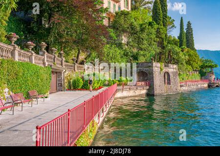 Beautiful blonde girl in Varenna, the Lombard village of lovers on Lake Como Stock Photo