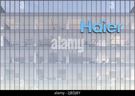 Qingdao, China. May 2, 2022. Editorial Use Only, 3D CGI. Haier Signage Logo on Top of Glass Building. Workplace of Home Appliance Company Office Headq Stock Photo