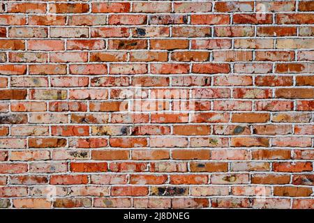 Background is wall old red burnt brick Stock Photo