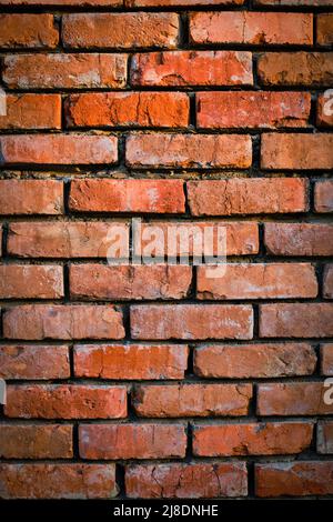 Background is wall old red burnt brick Stock Photo