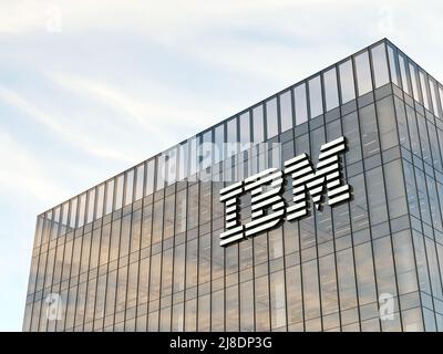 Armonk, NY, USA. May 2, 2022. Editorial Use Only, 3D CGI. IBM Corporation Signage Logo on Top of Glass Building. Workplace Technology Hardware Company Stock Photo