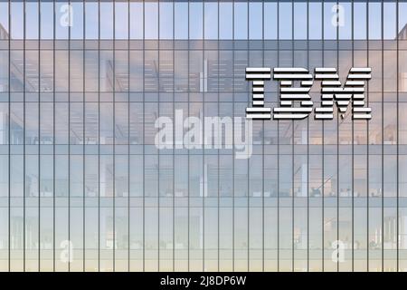 Armonk, NY, USA. May 2, 2022. Editorial Use Only, 3D CGI. IBM Corporation Signage Logo on Top of Glass Building. Workplace Technology Hardware Company Stock Photo