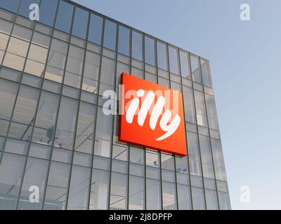 Trieste, Italy. May 2, 2022. Editorial Use Only, 3D CGI. Illy Corporation Signage Logo on Top of Glass Building. Workplace Coffee Company Office Stock Photo