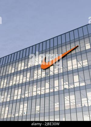 Beaverton, OR, USA. May 2, 2022. Editorial Use Only, 3D CGI. Nike Signage Logo on Top of Glass Building. Workplace Multinational Sportswear Company Of Stock Photo