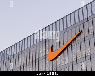 Beaverton, OR, USA. May 2, 2022. Editorial Use Only, 3D CGI. Nike Signage Logo on Top of Glass Building. Workplace Multinational Sportswear Company Of Stock Photo