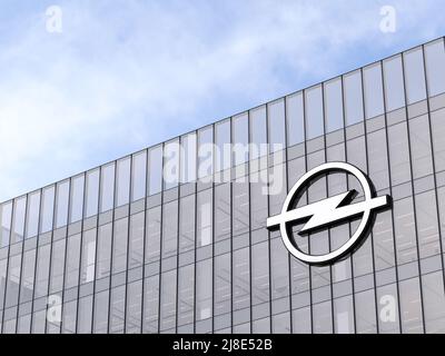 Russelsheim, Germany. May 2, 2022. Editorial Use Only, 3D CGI. Opel Company Signage Logo on Top of Glass Building. Workplace Vehicles Automaker Office Stock Photo